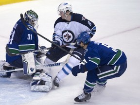 The last time the Jets visited Rogers Arena it was a physical game. Expect the same on Tuesday night. THE CANADIAN PRESS/Jonathan Hayward
