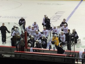 Claude Noel goes over drills with the troops at Vancouver Giants practice on Tuesday at the Pacific Coliseum.