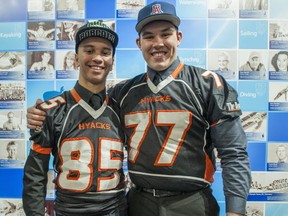 Matt Seymour (left) and Harper Sherman, both of the New Westminster Hyacks, signed their NCAA letters of intent in Vancouver on Wednesday. (Arlen Redekop, PNG)