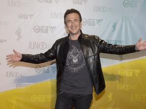 Colin James poses for photographs on the red carpet during the 2013 Juno Awards in Regina on Sunday, April 21, 2013. THE CANADIAN PRESS/Liam Richards ORG XMIT: NSD131