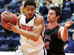 Simon Fraser's Roderick Evans-Taylor (left) scored a game-high 23 points to help the Clan top Matyas Hering and the Northwest Nazarene Crusaders on Thursday night atop Burnaby Mountain. (Ron Hole, SFU athletics)