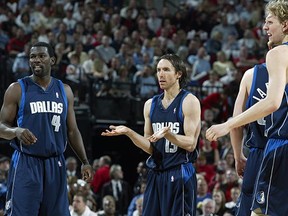 Steve Nash, centre, with teammates Michael Finley (left) and Dirk Nowitzki during his 2003 season with the Dallas Mavericks. (Getty Images files)