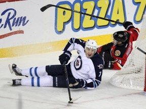 There's a nutzo scenario where the Flames and Jets could find themselves playing for a tie to eliminate the Kings on the last day of the season. (Colleen De Neve/Calgary Herald)