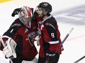 Dalton Sward congratulates Payton Lee after a victory. Sward graduated from the WHL at the close of the Vancouver Giants' season after five years with the club. (Getty Images.)