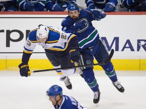 Zack Kassian, , airborne on Sunday night vs. St. Louis, was firmly on the ground on Monday. THE CANADIAN PRESS/Darryl Dyck