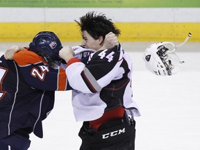 Vancouver defenceman Mason Geertsen has always had a physical aspect to his game, like Kamloops' Ryan Rehill found out in this 2014 scrap. Geertsen developed his offensive game this season and is hoping to sign an entry-level contract with the Colorado Avalanche in the coming days. (Getty Images File.)