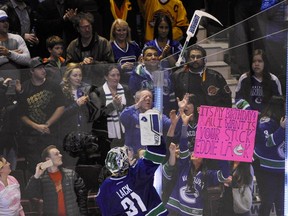 The girl with the pink sign? It was her birthday and Eddie Lack gave her his stick. (Mark van Manen /PNG)