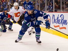 Brad Richardson, shown here in January action against Calgary, was a welcome addition for the Canucks' Saturday night game against the Leafs.