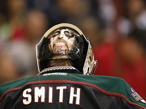 Mike Smith's mask for throwback night featured Coyotes fan Alice Cooper on the back.