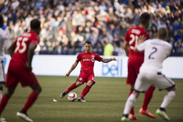 Toronto FC midfielder Sebastian Giovinco (10) takes a penalty kick against the Vancouver Whitecaps during the second half of an MLS soccer game in Vancouver, B.C., on Saturday, March 7, 2015. THE CANADIAN PRESS/Jimmy Jeong