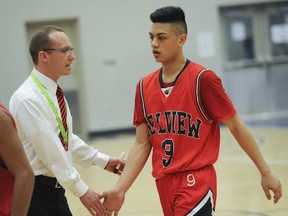 After posing a near quad-double on Wednesday on Day 1 of the BC championships. Wowie Untalan (right) and coach Vlad Nikic share a special moments at the LEC. (Jason Payne, PNG photo)