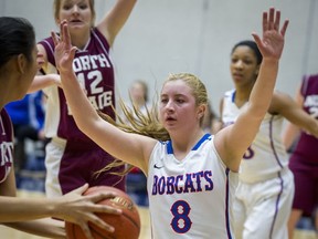 Brookswood senior Amanda Boettcher can take a charge on the court like no other. (Ric Ernst, PNG photo)