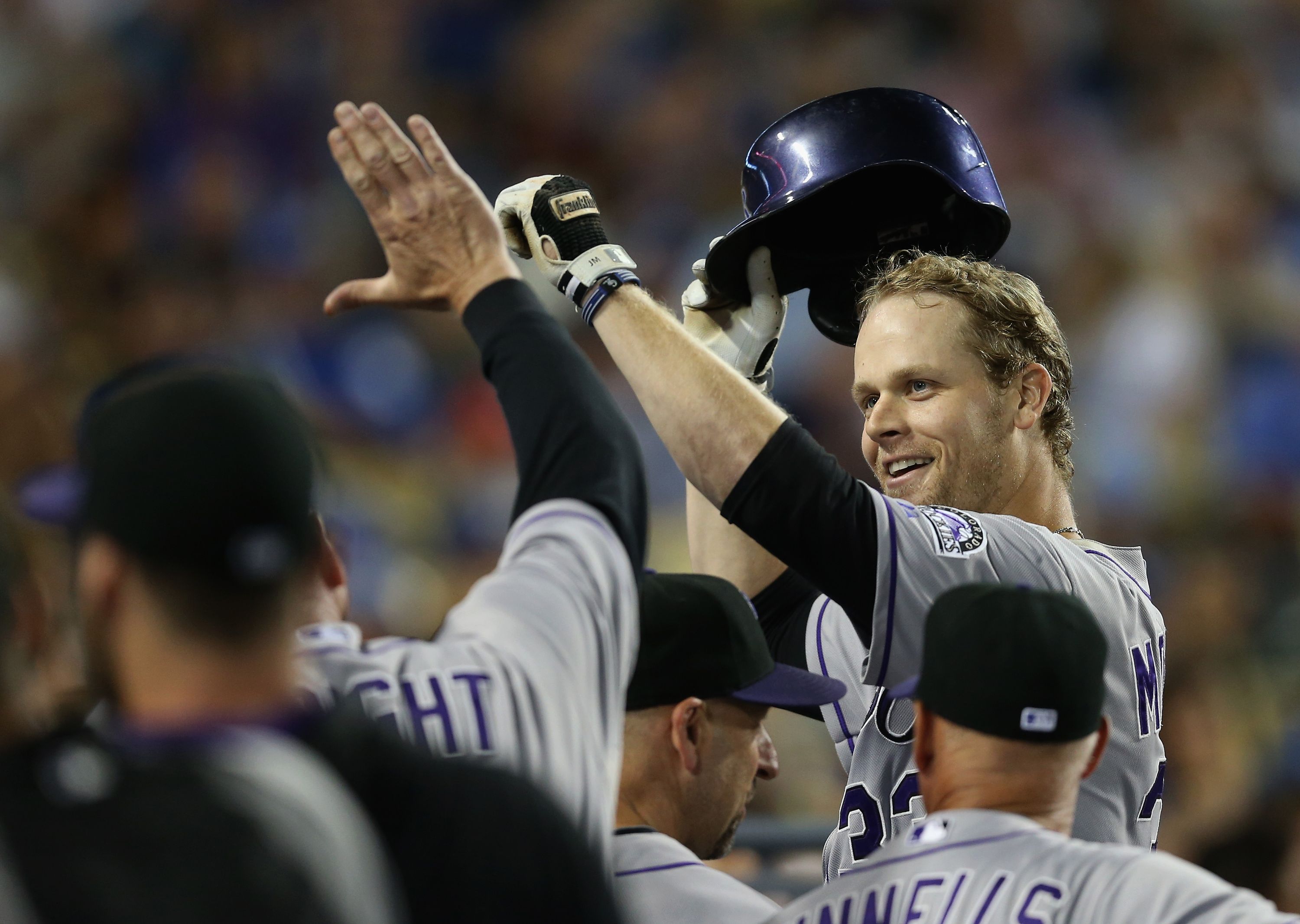 Why is Justin Morneau so excited? He's sitting first on Steve Ewen's Opening Day 2015 Canadian MLB Power Rankings.  (Photo by Jeff Gross/Getty Images)