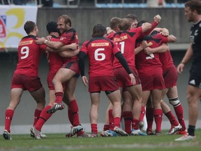 Canada celebrate victory over New Zealand during the match between New Zealand and Canada during day two of the Tokyo Sevens Rugby 2015 at Chichibunomiya Rugby Stadium on April 5, 2015 in Tokyo, Japan.  (Photo by Chris McGrath/Getty Images)