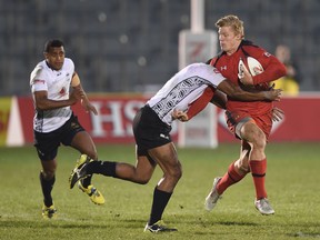 For the second time in a year, Fiji scored on the game's final play to defeat Canada in rugby sevens. (TORU YAMANAKA/AFP/Getty Images)