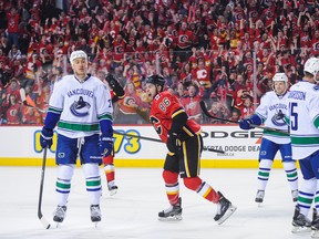 It started badly and ended badly for the Canucks on Sunday night in Calgary. (Photo by Derek Leung/Getty Images)