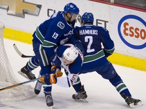 Nick Bonino will play for the USA while Dan Hamhuis will play for Canada at the 2015 World Championships. Gerry Kahrmann  /  PNG)