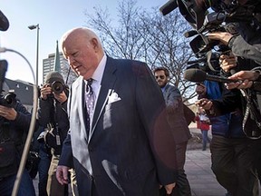 Suspended senator Mike Duffy leaves the courthouse in Ottawa on Tuesday.