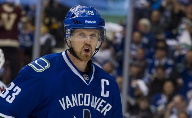 VANCOUVER, BC: April 15, 2015 --  Vancouver Canucks Henrik Sedin after missing an scoring opportunity against the Calgary Flames during the third period of Game 1 of the Western Conference's Pacific Division 2015 Stanley Cup playoff match up at Rogers Arena  in Vancouver, B.C. Wednesday April 15, 2015. The Flames defeated the Canucks 2-1 after Kris Russell scored with 30 seconds left in the game.  (photo by Ric Ernst / PNG)  (Story by sports)  TRAX #: 00036022A & 00036022D [PNG Merlin Archive]