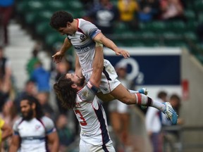 Danny Barrett and Madison Hughes of USA celebrate their victory in the Cup Final match between Australia and USA in the Marriott London Sevens at Twickenham Stadium on May 17, 2015 in London, England.  (Photo by Christopher Lee/Getty Images)