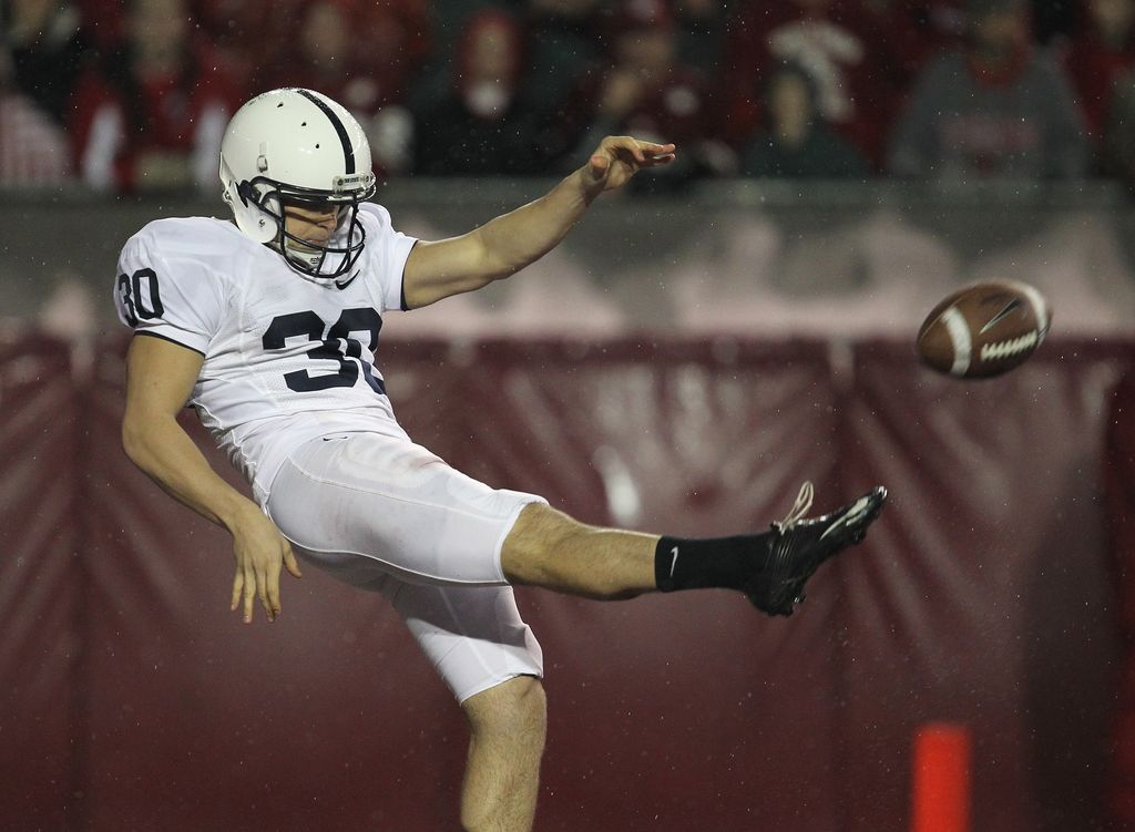 MADISON, WI - NOVEMBER 26:  Anthony Fera #30 of the Penn State Nittany Lions punts the ball against the Wisconsin Badgers at Camp Randall Stadium on November 26, 2011 in Madison, Wisconsin. Wisconsin defeated Penn State 45-7.  (Photo by Jonathan Daniel/Getty Images)