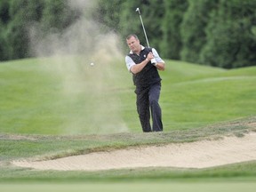 Alain Vigneault took part in the 28th annual Canucks For Kids Fund Jake Milford Charity Invitational Golf Tournament at Northview Golf and Country Club in Surrey, BC Wednesday, September 14, 2011.  (Photo by Jason Payne/ PNG)