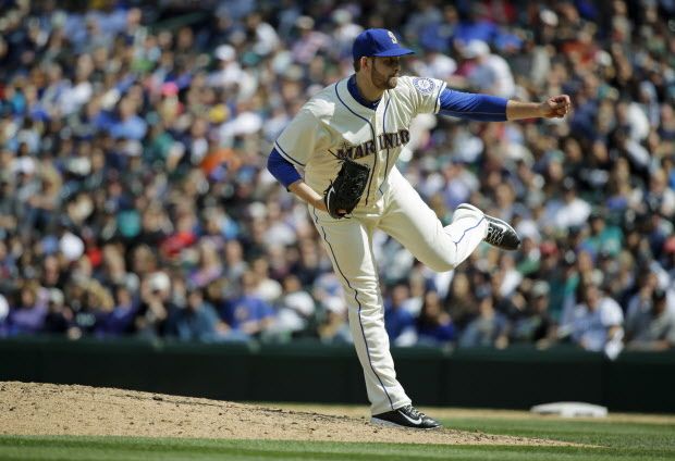 Seattle Mariners starting pitcher James Paxton finishes his delivery as he throws against the Boston Red Sox in the eighth inning of a baseball game, Sunday, May 17, 2015, in Seattle. (AP Photo/Ted S. Warren)