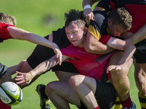 The Shawnigan Lake Stags made the going tough for Vancouver's St. George's Saints in Saturday's B.C. boys Triple A rugby final. (Gerry Kahrmann, PNG)