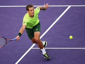Vasek Pospisil in action at the Miami Open earlier this year. (Photo by Clive Brunskill/Getty Images)