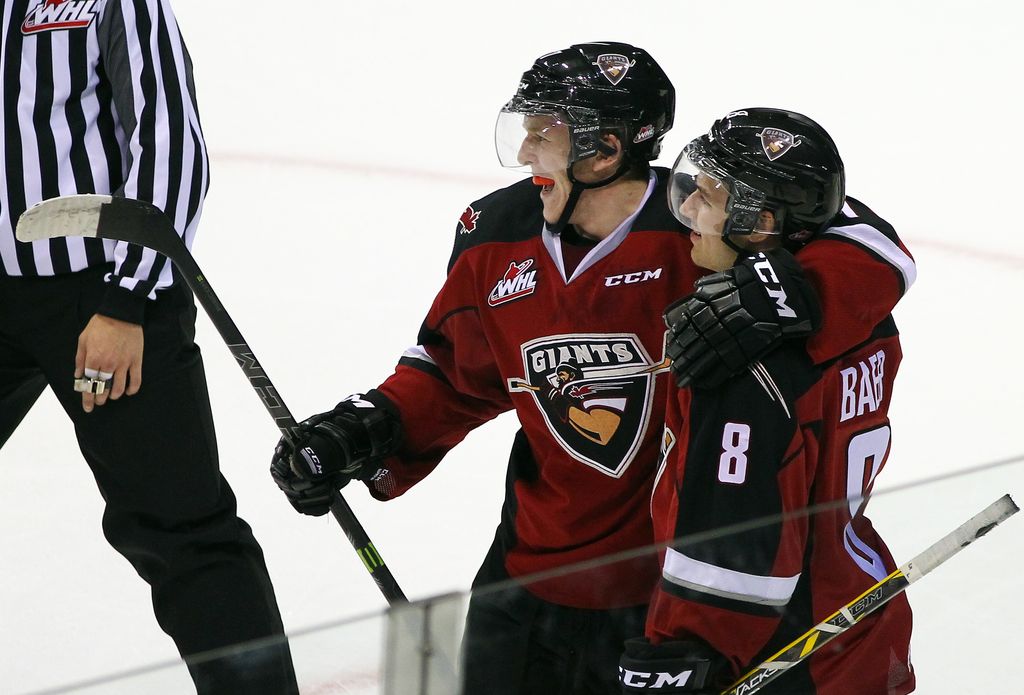 Tyler Benson and Alec Baer celebrate a Giants goal last season. Will they be linemates next year? If so, will they have a newcomer as their centre? Will that player be acquired Thursday? (Getty Images File.)