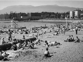 View of the beach at English Bay, with Englesea Lodge in the background, on July 4, 1954.