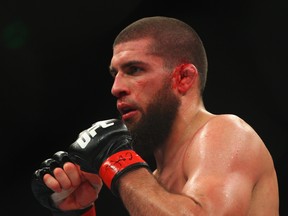 SYDNEY, AUSTRALIA - MARCH 03:  Court McGee of the USA bleeds from his ear during the UFC On FX light middleweight bout between Court McGee and Constantinos Philippou at Allphones Arena on March 3, 2012 in Sydney, Australia.  (Photo by Mark Kolbe/Getty Images)