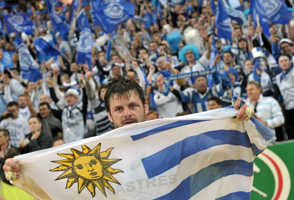 Uruguayan lock Rodrigo Capo-Ortega celebrates winning the French Top 14 rugby union final match between Rugby Club Toulonnais and Castre Olympique on June 1, 2013 at the Stade de France in Saint-Denis, outside Paris.   AFP PHOTO / BERTRAND LANGLOIS        (Photo credit should read BERTRAND LANGLOIS/AFP/Getty Images)