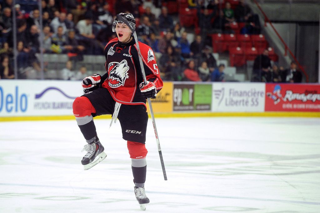 BLAINVILLE-BOISBRIAND, QC - MARCH 12:  Jeremy Lauzon #5 of the Rouyn-Noranda Huskies celebrates his second period goal during the QMJHL game against the the Blainville-Boisbriand Armada at the Centre Excellence Rousseau on March 12, 2015 in Blainville-Boisbriand, Quebec, Canada.  The Huskies defeated the Aramada 5-1.  (Photo by Richard Wolowicz/Getty Images)