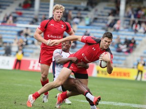 Justin Douglas and John Moonlight in action for Canada against the USA at the Tokyo Sevens. Both could feature this weekend.  (Photo by Ken Ishii/Getty Images for TOSHIBA CORPORATION)
