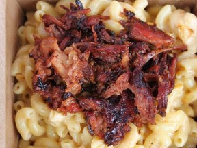 Jurassic Pork, mac 'n' cheese topped with pulled pork and crispy onions, is one of several inspired offerings at this year's Pacific National Exhibition.