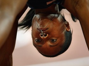 Muna Lee, pictured in the blocks of 200m heats at 2008 Beijing Olympics, runs in the Canadian University Invitational Friday in Langley. (Getty Images)