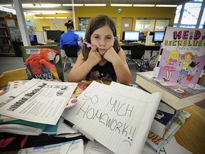 Nine-year-old Arieanna Shaughnessy and her mom say she is buried under a heavy homework load. (Mark van Manen, PNG)