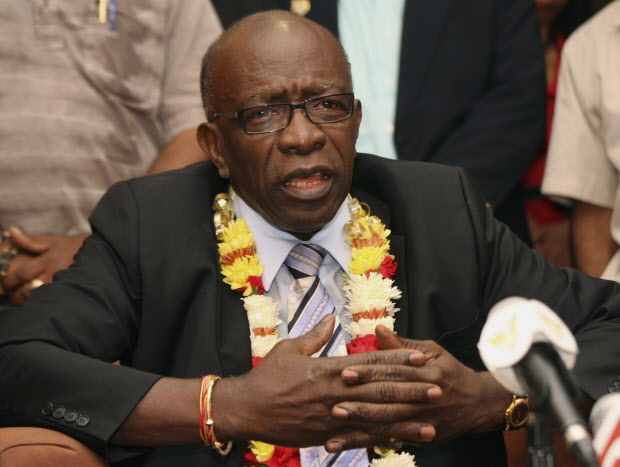 FILE - In this Thursday, June 2, 2011 file photo, suspended FIFA executive Jack Warner gestures during a news conference held shortly after his arrival at the airport in Port-of-Spain, in his native Trinidad and Tobago. Warner was one of the 14 people indicted Wednesday May 27, 2015 in the U.S. on corruption charges.  (AP Photo/Shirley Bahadur, File)