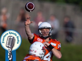 B.C. Lions' quarterback Travis Lulay passes to Andrew Harris during the first half of a pre-season CFL football game against the Edmonton Eskimos in Vancouver, B.C., on Friday June 19, 2015. THE CANADIAN PRESS/Darryl Dyck
