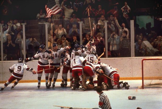 FILE -In this Feb. 22, 1980 file photo, the U.S. hockey team pounces on goalie Jim Craig after a 4-3 victory against the Soviets in the 1980 Olympics, as a flag waves from the partisan Lake Placid, N.Y. crowd. Its been more than three decades since his landmark goal became the centerpiece of the U.S. Olympic hockey teams Miracle on Ice. For 60-year-old Mike Eruzione, it still seems like only yesterday. (AP Photo, File)