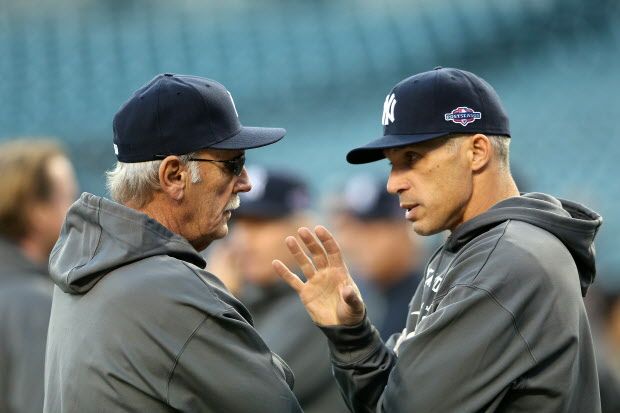 DETROIT, MI - OCTOBER 16:  Manger Jim Leyland (L) of the Detroit Tigers talks with manager Joe Girardi of the New York Yankees during batting practice prior to game three of the American League Championship Series at Comerica Park on October 16, 2012 in Detroit, Michigan.  (Photo by Leon Halip/Getty Images) ORG XMIT: 154226113