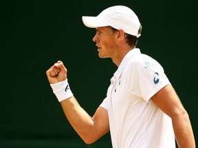 Vasek Pospisil of Canada celebrates a point in his Gentlemen's Singles Fourth Round match against Viktor Troicki of Serbia during day seven of the Wimbledon Lawn Tennis Championships at the All England Lawn Tennis and Croquet Club on July 6, 2015 in London, England. He plays Andy Murray in the quarterfinals on Wednesday. (Photo by Ian Walton/Getty Images)