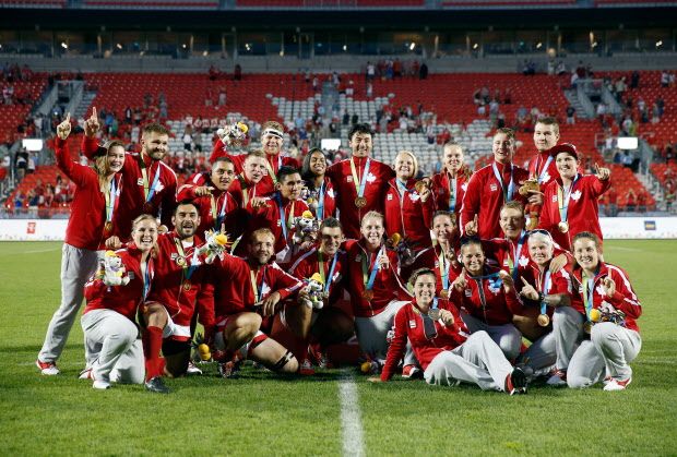 TORONTO, ON - JULY 12:  The Canadian men's and women's Rugby 7 teams pose for a picture after they both won the gold medal on Day 2 of the Toronto 2015 Pan Am Games on July 12, 2015 in Toronto, Canada.  (Photo by Ezra Shaw/Getty Images)