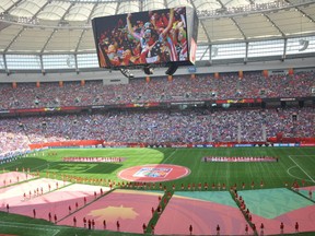 USA fans cheer on their team before the 2015 FIFA Women's World Cup final between the USA and Japan at BC Place Stadium in on July 5, 2015.