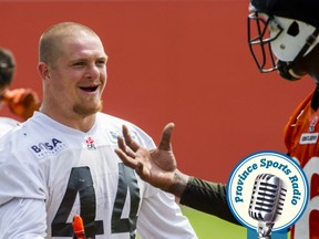 SURREY, BC: July 8, 2015 -- BC Lions Adam Bighill, left at the CFL team's practice facilities in Surrey, B.C. Wednesday July 8, 2015.   (photo by Ric Ernst / PNG)  (Story by Lowell Ullrich)  TRAX #: 00037793A