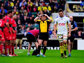 Jamie Cudmore (white jersey) of Clermont leaves the field early in the first half due to concussion during the European Rugby Champions Cup Final match between ASM Clermont Auvergne and RC Toulon at Twickenham Stadium on May 2, 2015 in London, England.  (Photo by Stu Forster/Getty Images)