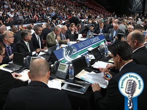 A general view of the Vancouver Canucks draft table is seen during the 2015 NHL Draft at BB&T Center on June 27, 2015 in Sunrise, Florida.  (Photo by Dave Sandford/NHLI via Getty Images)