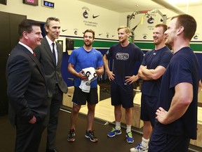 Canucks president Trevor Linden introduces then new GM Jim Benning to 'the core.'