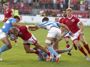 Jones on the attack during the buildup to his game-winning try. THE CANADIAN PRESS/Chris Young